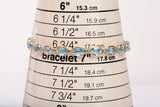 Ladies 14k Yellow Gold Oval Cut Synthetic Aquamarine Tennis Bracelet 7.75"