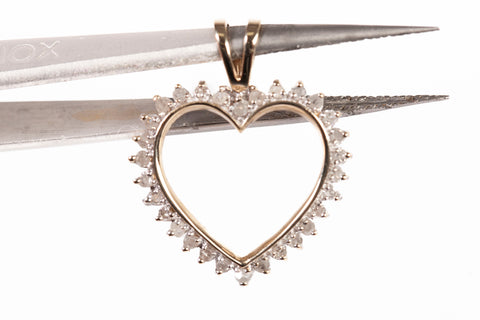 Ladies 10k Yellow Gold Open Heart Diamond Accent Pendant .150tcw