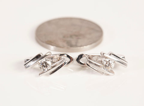 Ladies 18k White Gold Diamond Huggie Earrings