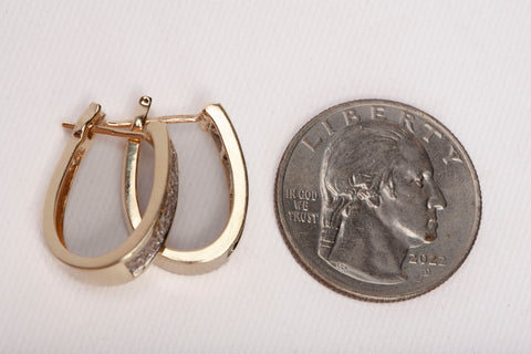 Ladies 14k Yellow Gold Oval Shaped Hoops with Diamond Accents