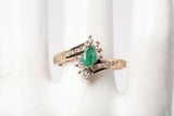 Ladies 10k Yellow Gold Emerald with Diamond Accents Bypass Ring