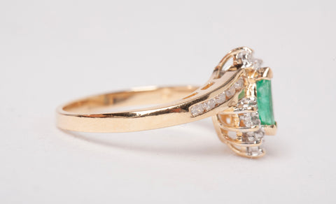 Ladies 10k Yellow Gold Emerald with Diamond Accents Bypass Ring