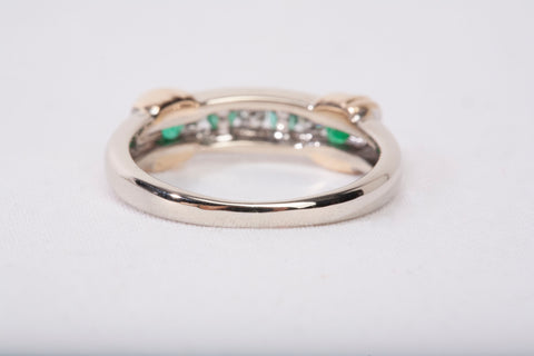 Ladies 14k Two-Tone Channel Set Diamond and Emerald Half Eternity Band