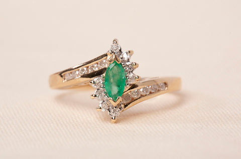 Ladies 10k Yellow Gold Emerald with Diamond Accents Bypass Ring