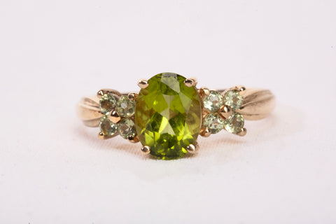 Ladies 10k Yellow Gold Oval Cut Peridot Cocktail Ring