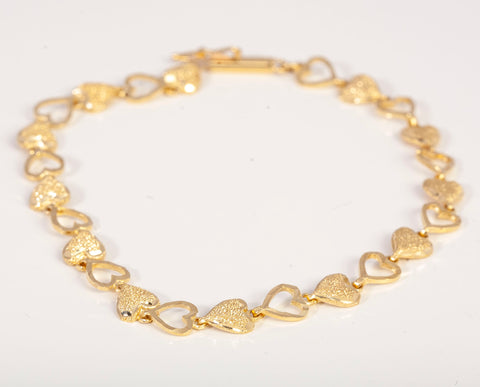 Ladies 14k Yellow Gold Brushed and Open Diamond Cut Heart Bracelet Size 6.75"