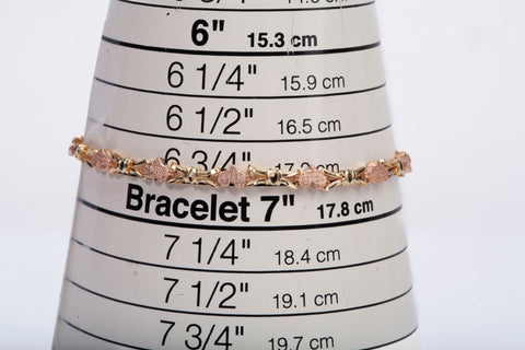 Ladies 14k Two Tone Gold Hearts & Bows Link Bracelet