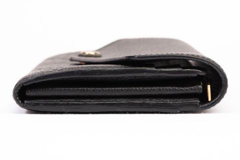Authentic Louis Vuitton Black Monogram Empreinte Leather Sarah Wallet