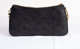 Authentic Louis Vuitton Black Monogram Empreinte Leather Liv Pochette