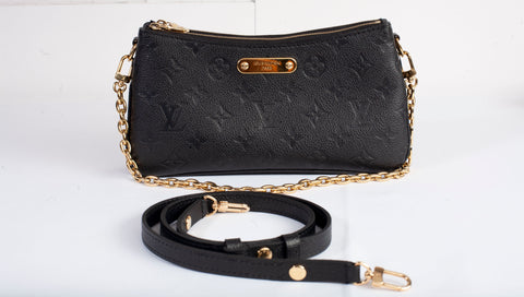 Authentic Louis Vuitton Black Monogram Empreinte Leather Liv Pochette