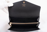 Authentic Louis Vuitton Black Monogram Empreinte Leather Sarah Wallet