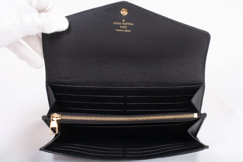 Authentic Louis Vuitton Black Monogram Empreinte Leather Sarah Wallet