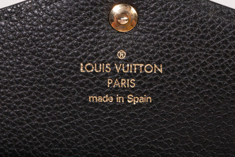 Authentic Louis Vuitton Black Monogram Empreinte Leather Sarah Wallet
