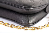 Authentic Louis Vuitton Black Monogram Empreinte Leather Liv Pochette