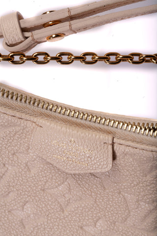 Authentic Cream Louis Vuitton Empreinte Easy Pouch On Strap