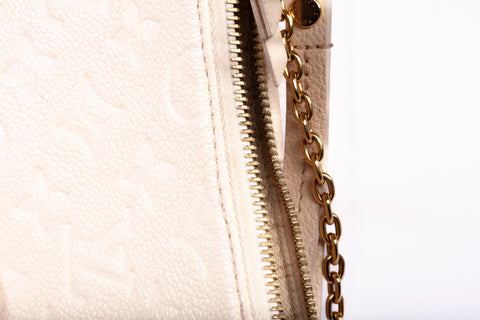 Authentic Cream Louis Vuitton Empreinte Easy Pouch On Strap