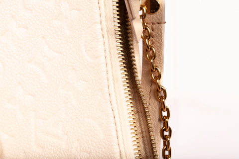 Authentic Cream Louis Vuitton Empreinte Easy Pouch On Strap