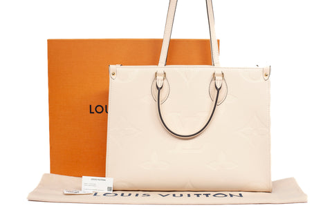 Authentic Louis Vuitton OnTheGo MM Cream Monogram Empreinte Tote Bag