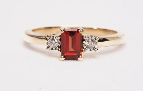Ladies 14k Yellow Gold Garnet Emerald Cut with Diamond Accents Ring