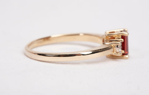 Ladies 14k Yellow Gold Garnet Emerald Cut with Diamond Accents Ring