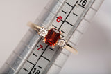 Ladies 14k Yellow Gold Garnet Emerald Cut with Diamond Accents Ring
