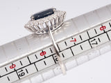Ladies 18k White Gold Sapphire and Diamond Halo Ring .62CTW