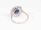 Ladies 18k White Gold Sapphire and Diamond Halo Ring .62CTW