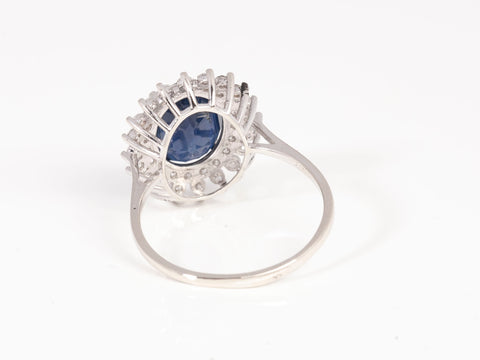 Ladies 18k White Gold Sapphire and Diamond Halo Ring .62CTW