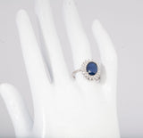 Ladies 18k White Gold Sapphire and Diamond Halo Ring .62CTW