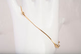 Ladies 18k Yellow Gold Oval Bead Station Bracelet