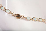 Ladies 14k Yellow Gold Oval Cut Opal Tennis Bracelet Size 7.25"