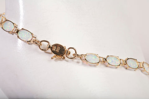Ladies 14k Yellow Gold Oval Cut Opal Tennis Bracelet Size 7.25"