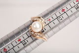 Ladies 14k Yellow Gold Pearl and Diamond Accents Bypass Ring