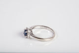 Ladies 14k White Gold Blue Sapphire with Diamond Halo Ring