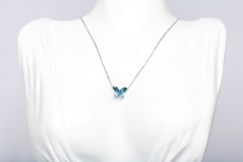 Ladies Dainty 14k White Gold Blue Topaz Butterfly Necklace