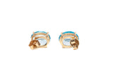 Ladies 14k Yellow Gold Oval Cut Blue Topaz Stud Earrings