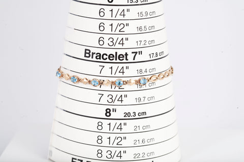 Ladies 10k Yellow Gold Blue Topaz Bracelet Size 7.25"