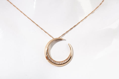 Ladies 14k Yellow Gold Crescent Moon with Diamond Accents Pendant