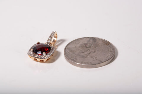 Ladies 10k Yellow Gold Cushion Cut Garnet with Diamond Halo Pendant