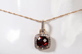 Ladies 10k Yellow Gold Cushion Cut Garnet with Diamond Halo Pendant