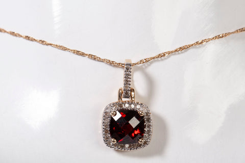 Ladies 10k Yellow Gold Cushion Cut Garnet with Diamond Halo Pendant