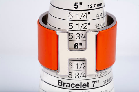 Authentic Hermes Ladies Orange and White Wide Clic Clac H Bracelet 6.25"