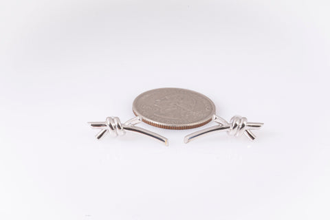Ladies 18k White Gold Knot Stud Earrings
