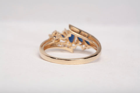14k Yellow Gold Marquise Cut Sapphire with Diamond Accents Bypass Ring
