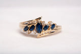 14k Yellow Gold Marquise Cut Sapphire with Diamond Accents Bypass Ring
