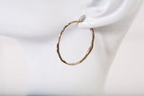 Ladies 14k Yellow Gold Oval Reef Textured Hoop Earrings