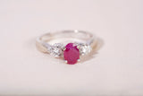 Ladies 18k White Gold Oval Cut Ruby and Diamond Three Stone Ring
