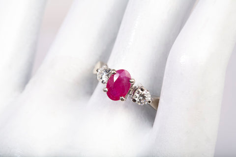 Ladies 18k White Gold Oval Cut Ruby and Diamond Three Stone Ring