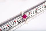 Ladies 18k White Gold Oval Cut Ruby and Diamond Three Stone Ring