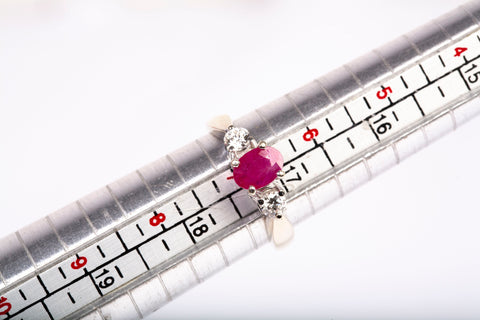 Ladies 18k White Gold Oval Cut Ruby and Diamond Three Stone Ring